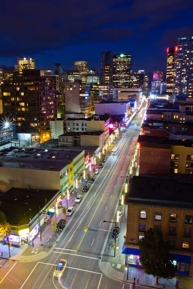 Aerial view of Granville Street lit up at nighttime.