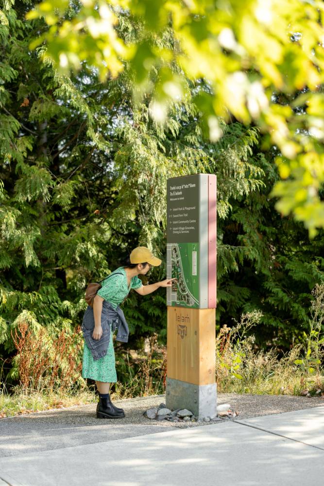 Photo of person reading sign.