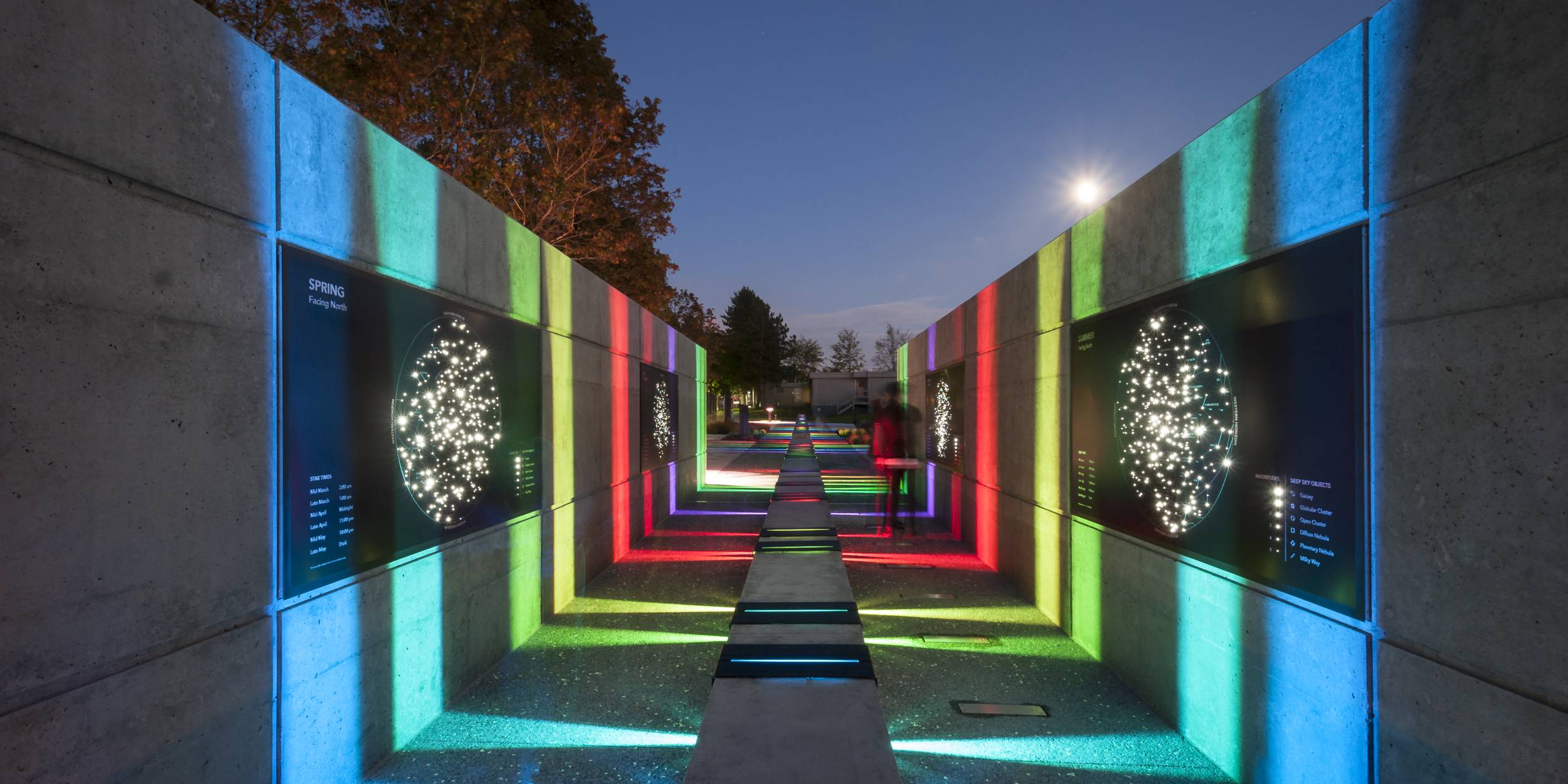 View of the observatory's multi-coloured lighting at nighttime.